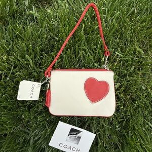 💙 SOLD on Mercari - NWT Coach Heart Wristlet